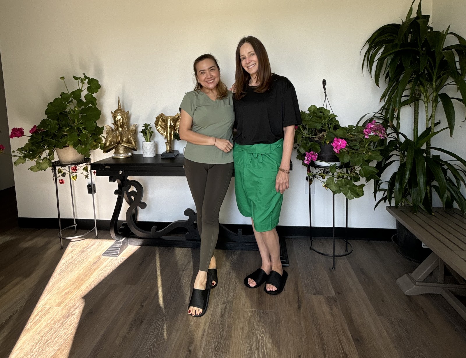 The Body Fix Thai Massage team in their plant-filled San Diego lobby